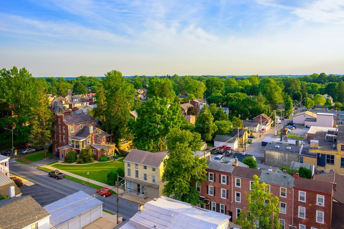 Aerial view of suburban houses and sunset sky at West Chester Pennsylvania