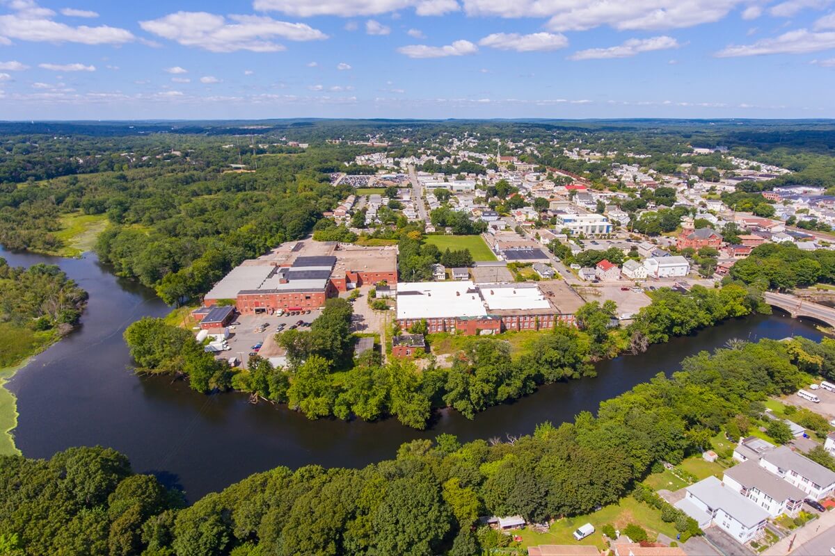 Cumberland historic town center aerial view on broad street with blackstone river in town center of Cumberland Rhode