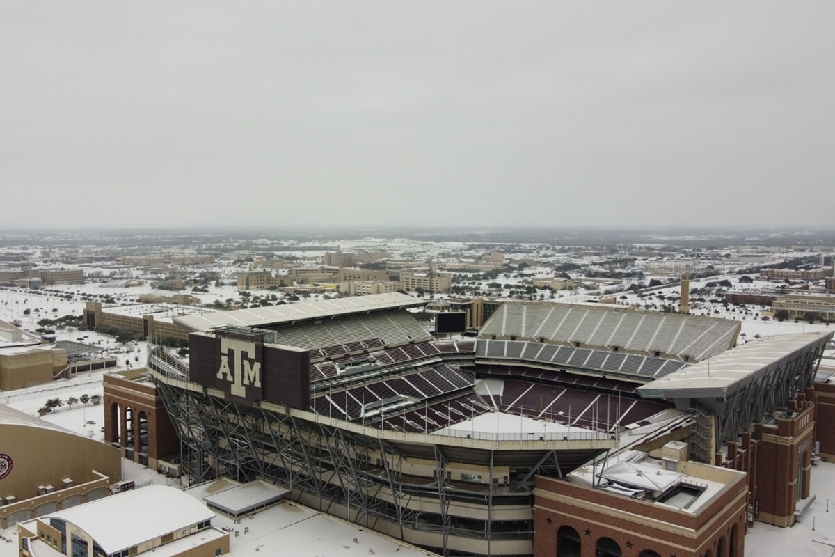 aerial view of the Kyle Football Field covered in snow in College Station, Texas, USA