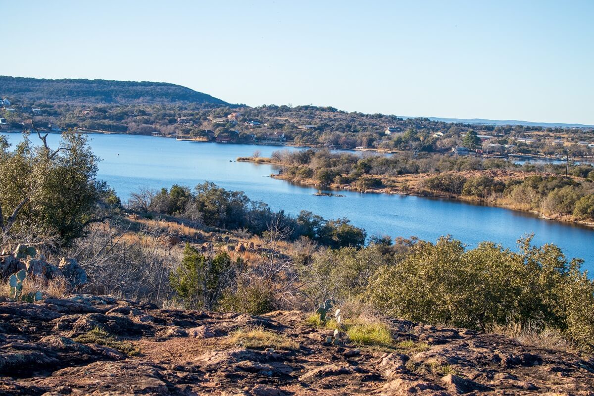 texas hill country lake views from the top of a hill on a trail located in inks lake state park Burnet Texas