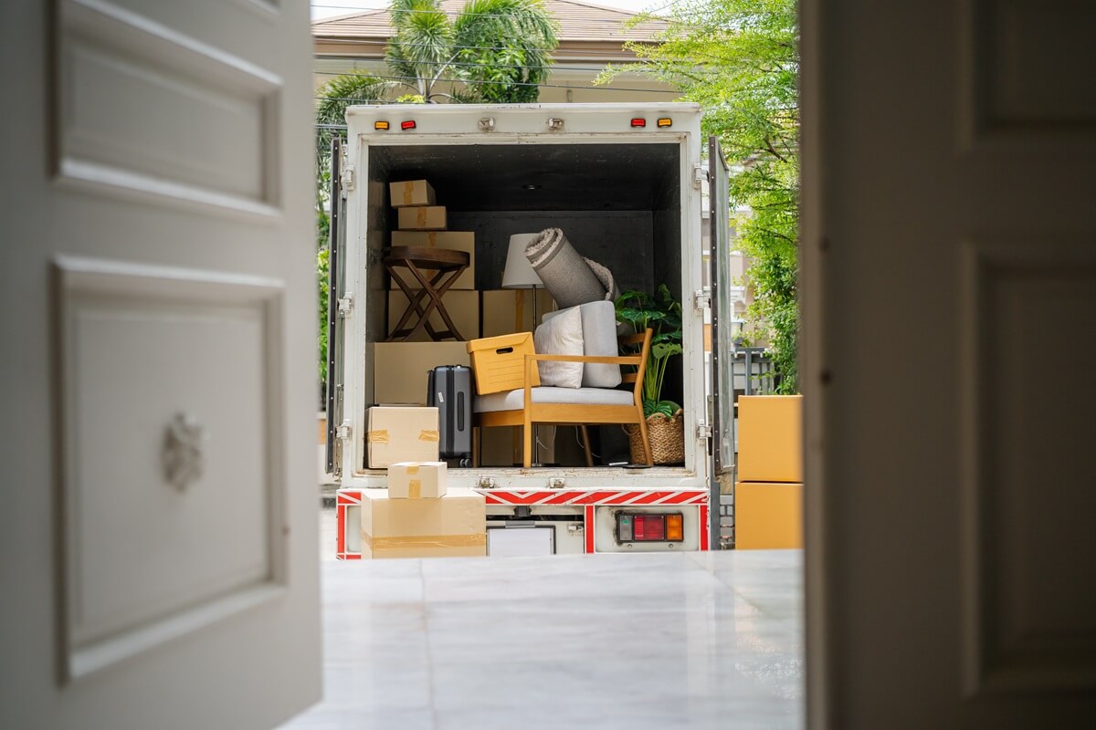 the back of a truck carrying goods moving house