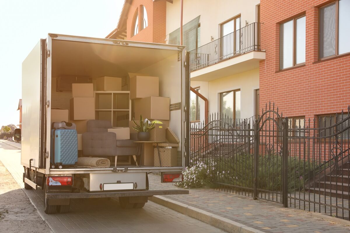 van full of moving boxes and furniture